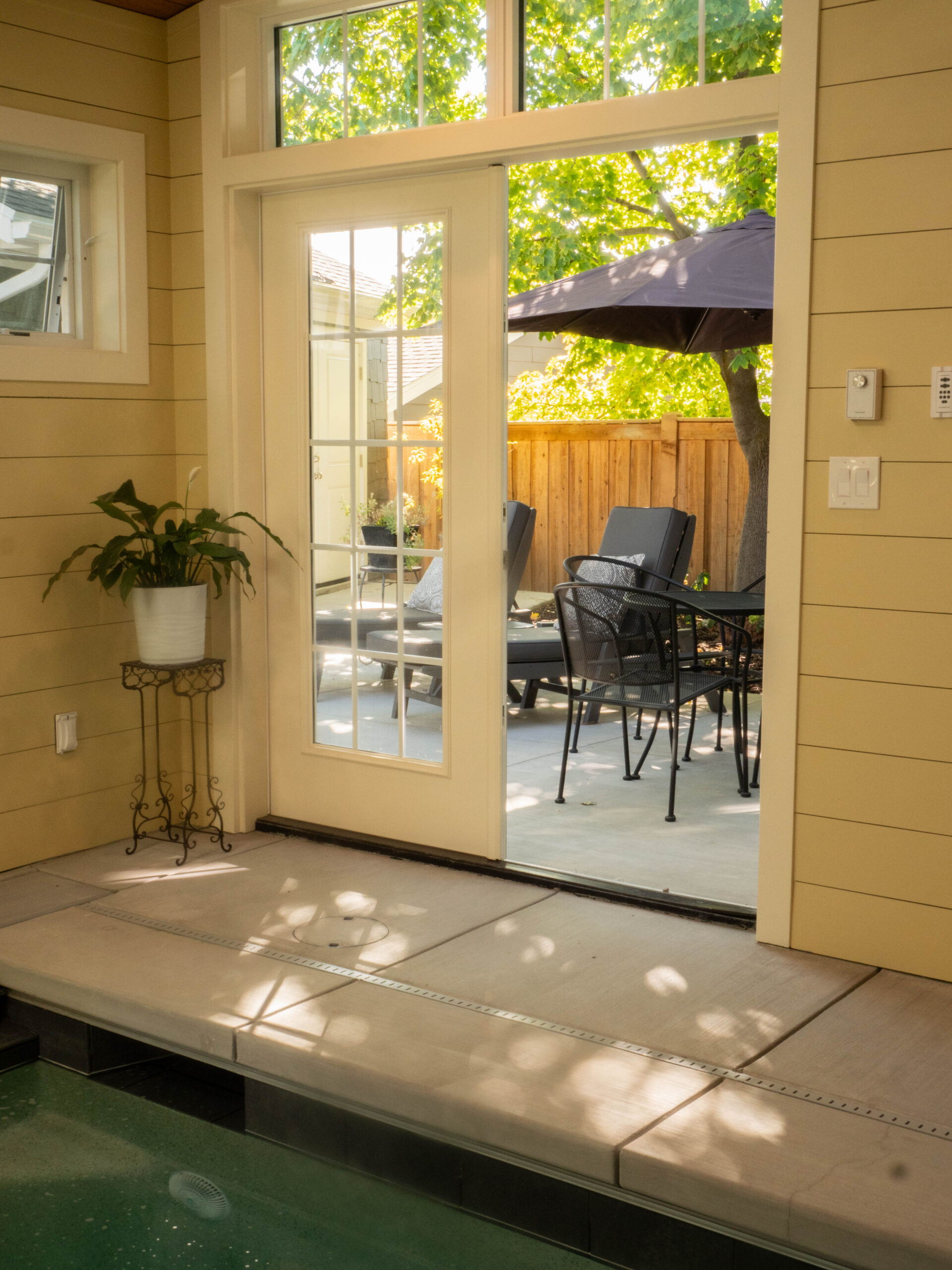French doors from the interior pool to the patio.