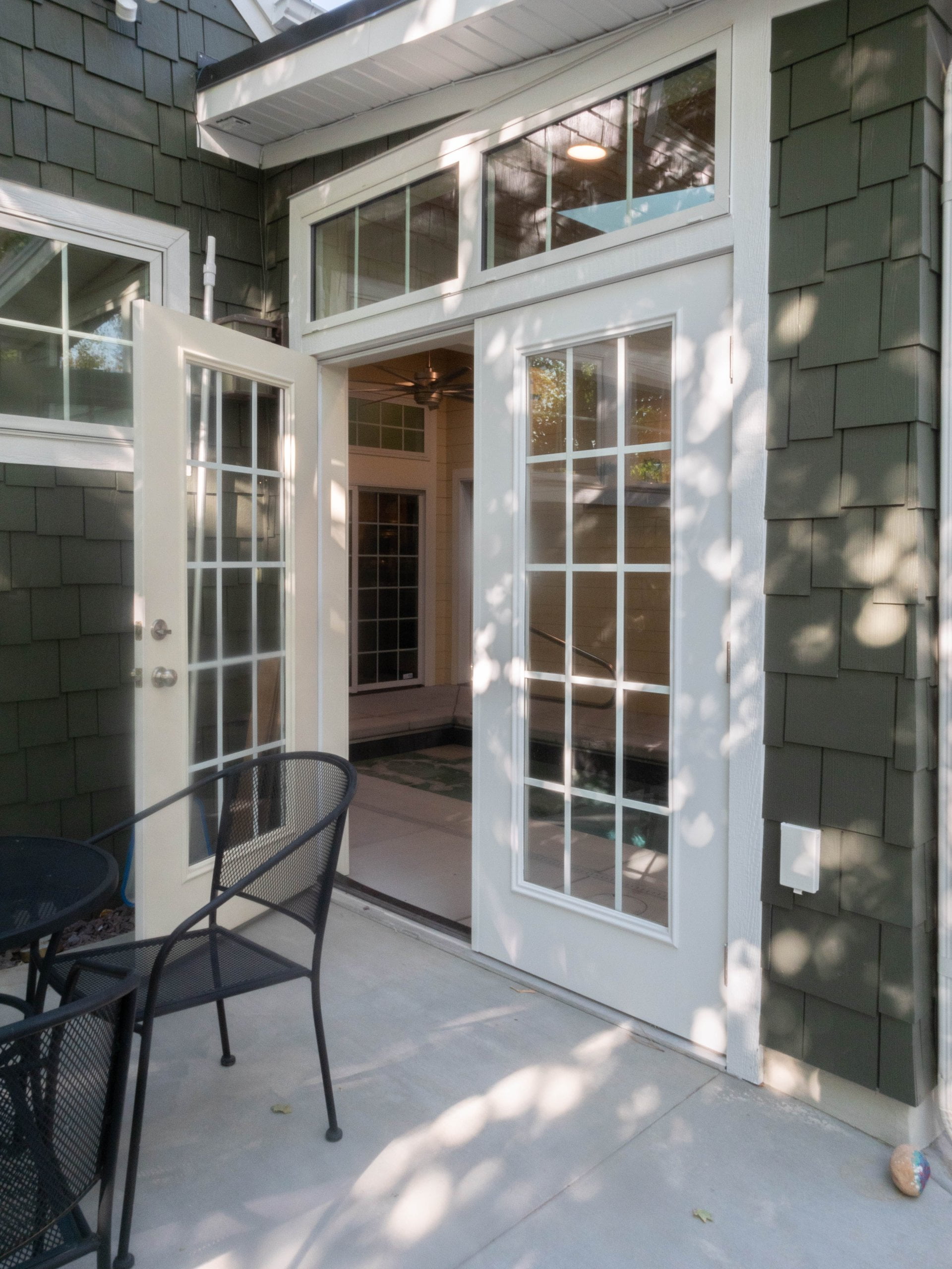 French doors leading to the pool.