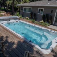 Thumbnail of http://Above%20ground%20pool%20with%20a%20deck%20built%20around%20it.