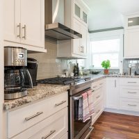 Cottage Kitchen Remodel White Cabinets Contemporary hardware | Renovation Design Group