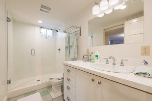 Full Bathroom, Walk in Shower, Checkered Tile Flooring, Tudors | Renovation Design Group