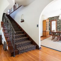 Staircase to second floor, Tudor, Entry Way, Full Stairs, Hard Wood, Bold Wallpaper | Renovation Design Group