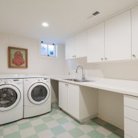 Basement Laundry Rooms, Storage in laundry Room, Tudor, Checkered Tile Flooring | Renovation Design Group