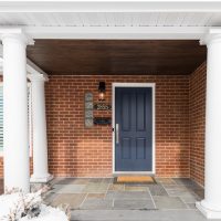 After, exterior, front porch, blue slate, blue front door, Columns | Renovation Design Group