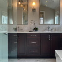 Primary suite bathroom with two sinks