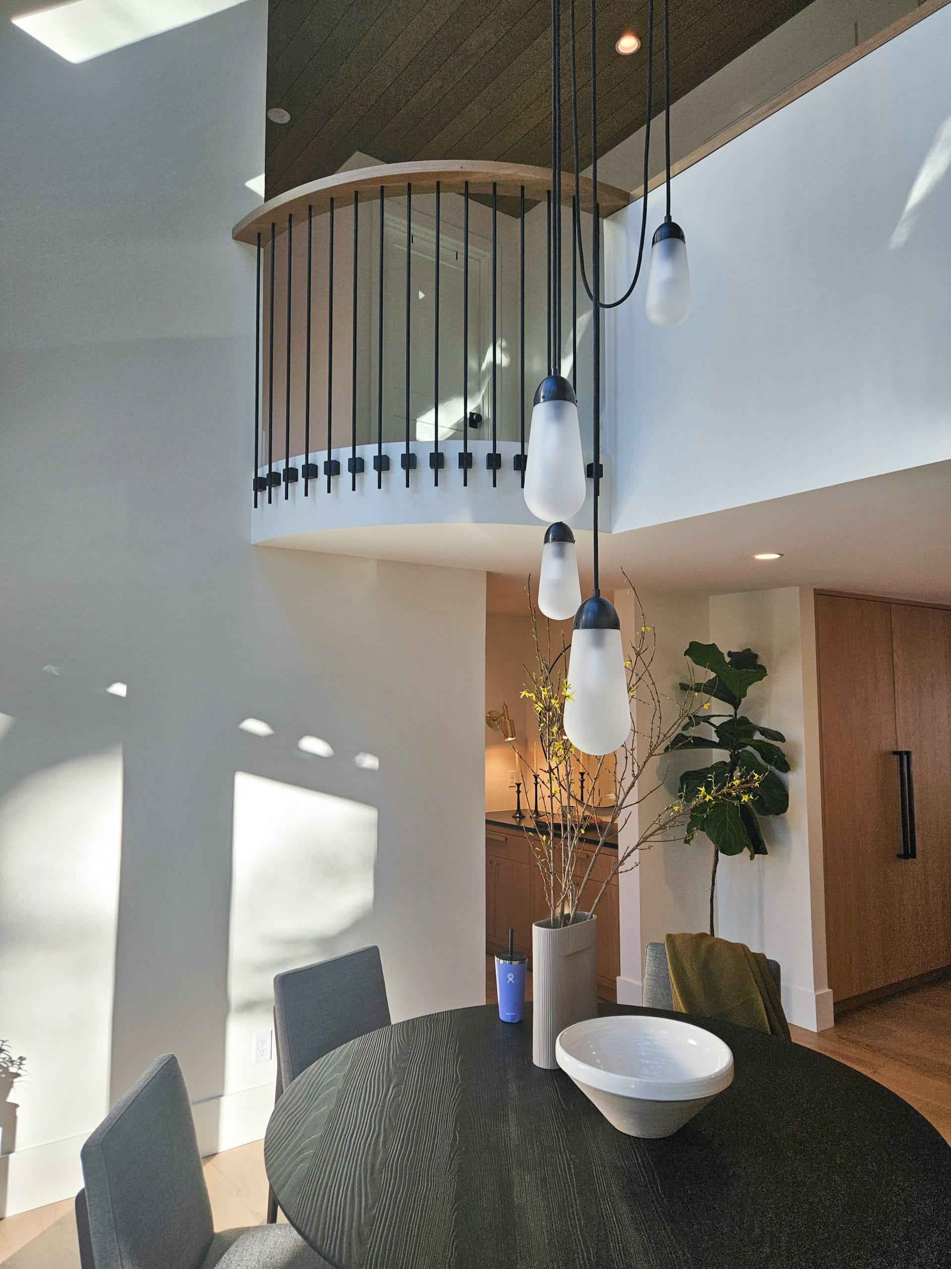 Dining room with small balcony above.