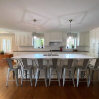 Thumbnail of http://Large%20and%20open%20concept%20kitchen%20that%20includes%20double%20ovens,%20an%20island%20with%20seating%20for%20seven%20and%20a%20sink,%20and%20lots%20of%20storage.