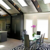 Thumbnail of http://skylights%20and%20window%20natural%20light,%20glass%20table,%20rug%20Murphy%20Bed%20contemporary%20bed,%20casework,%20galvanized%20ceiling%20|%20Renovation%20Design%20Group