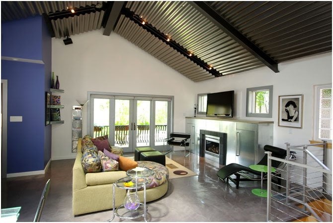 contemporary vaulted ceiling, fireplace, living space kitchen island, bar stool, contemporary kitchen, lighting skylights and window natural light, glass table, rug Murphy Bed contemporary bed, casework, galvanized ceiling | Renovation Design Group