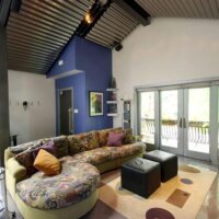 Thumbnail of http://contemporary%20vaulted%20ceiling,%20fireplace,%20living%20space%20contemporary%20vaulted%20ceiling,%20fireplace,%20living%20space%20kitchen%20island,%20bar%20stool,%20contemporary%20kitchen,%20lighting%20skylights%20and%20window%20natural%20light,%20glass%20table,%20rug%20Murphy%20Bed%20contemporary%20bed,%20casework,%20galvanized%20ceiling%20|%20Renovation%20Design%20Group