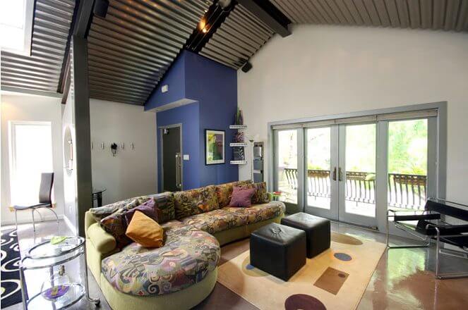 contemporary vaulted ceiling, fireplace, living space contemporary vaulted ceiling, fireplace, living space kitchen island, bar stool, contemporary kitchen, lighting skylights and window natural light, glass table, rug Murphy Bed contemporary bed, casework, galvanized ceiling | Renovation Design Group
