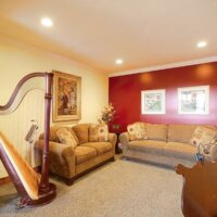 Thumbnail of http://music%20room%20with%20piano%20and%20harp%20|%20Renovation%20Design%20Group