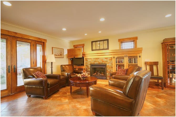 fireplace with bookshelves in family room | Renovation Design Group