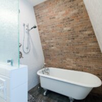 Brick Wall Bathroom Victorian Designs | Renovation Design Group