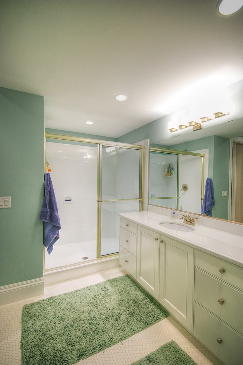 Bathroom Designs After_Interior_Green Bathroom_Cape Home | Renovation Design Group