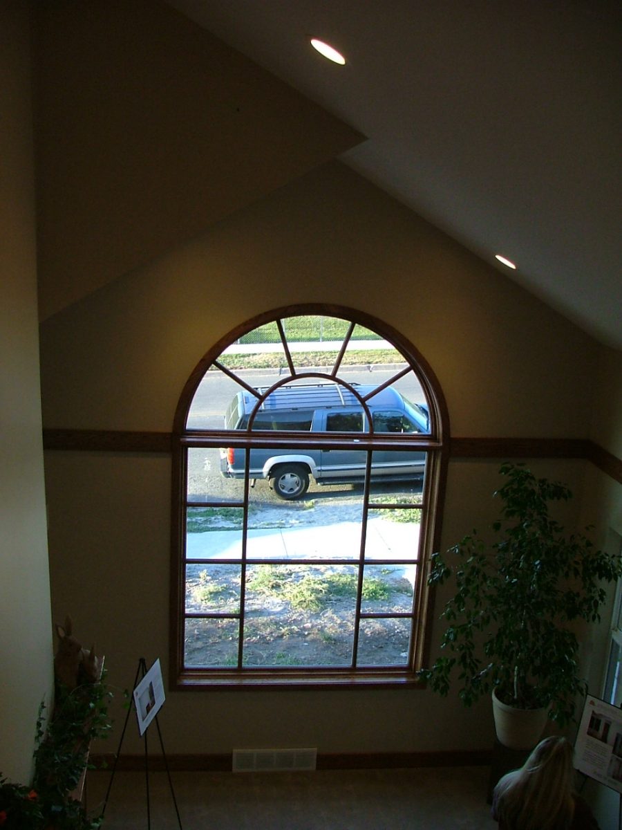 Duplex Renovations Large Window Living Room | Renovation Design Group