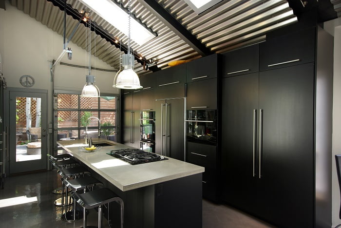 skylights and window natural light, glass table, rug | Renovation Design Group