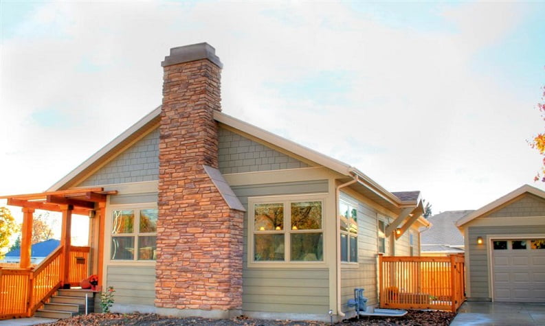 Exterior Home Remodel brick Chimney on Cottage home | Renovation Design Group