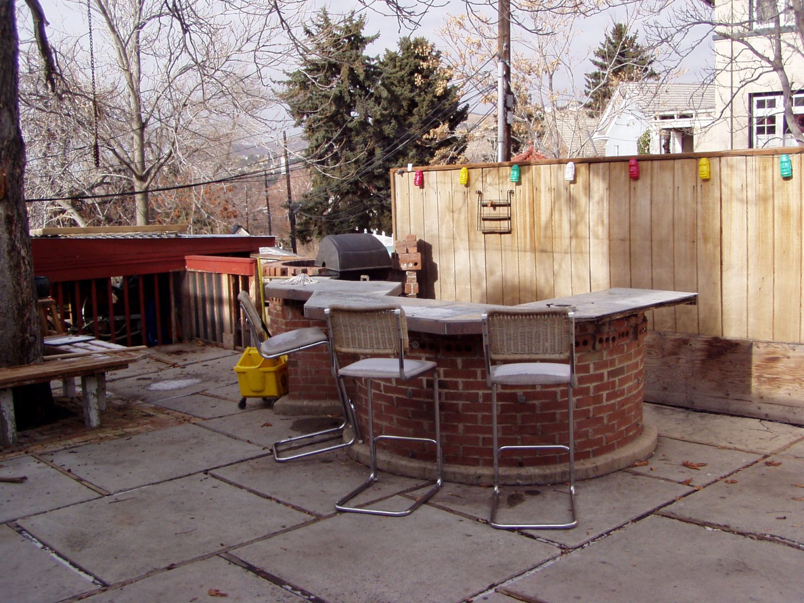 Before Back PAtio Renovated Frat House | Renovation Design Group