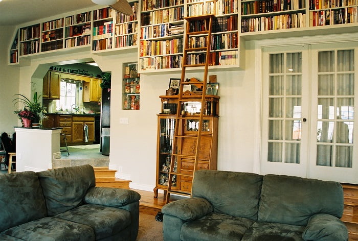 Living room Library with transition steps from kitchen | Renovation Design Group
