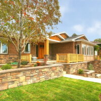 Thumbnail of http://Exterior%20ranch%20stone%20clad%20retaining%20walls%20|%20Renovation%20Design%20Group