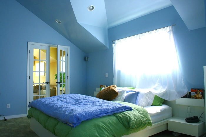 Master Suite with French doors natural light | Renovation Design Group