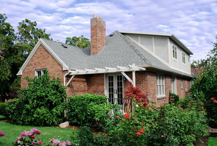 Porch Back Exterior Tudor Brick | Renovation Design Group