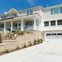 Thumbnail of http://Two-story%20exterior%20remodel%20large%20front%20porch%20|%20Renovation%20Design%20Group