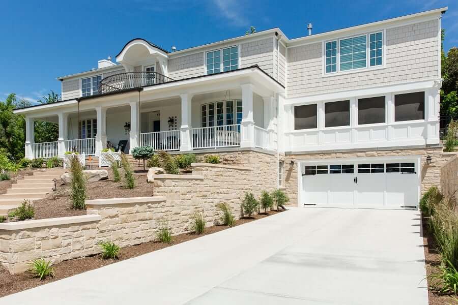 Two-story exterior remodel large front porch | Renovation Design Group