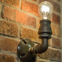 Thumbnail of http://After%20Interior%20Remodels_Bathroom%20Brick_Industrial%20Lighting%20|%20Renovation%20Design%20Group