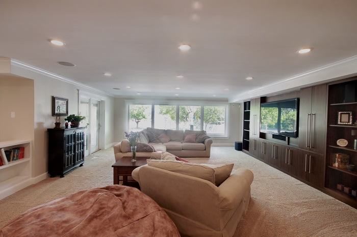 After Whole House Renovation Basement Remodel Living Room | Renovation Design Group