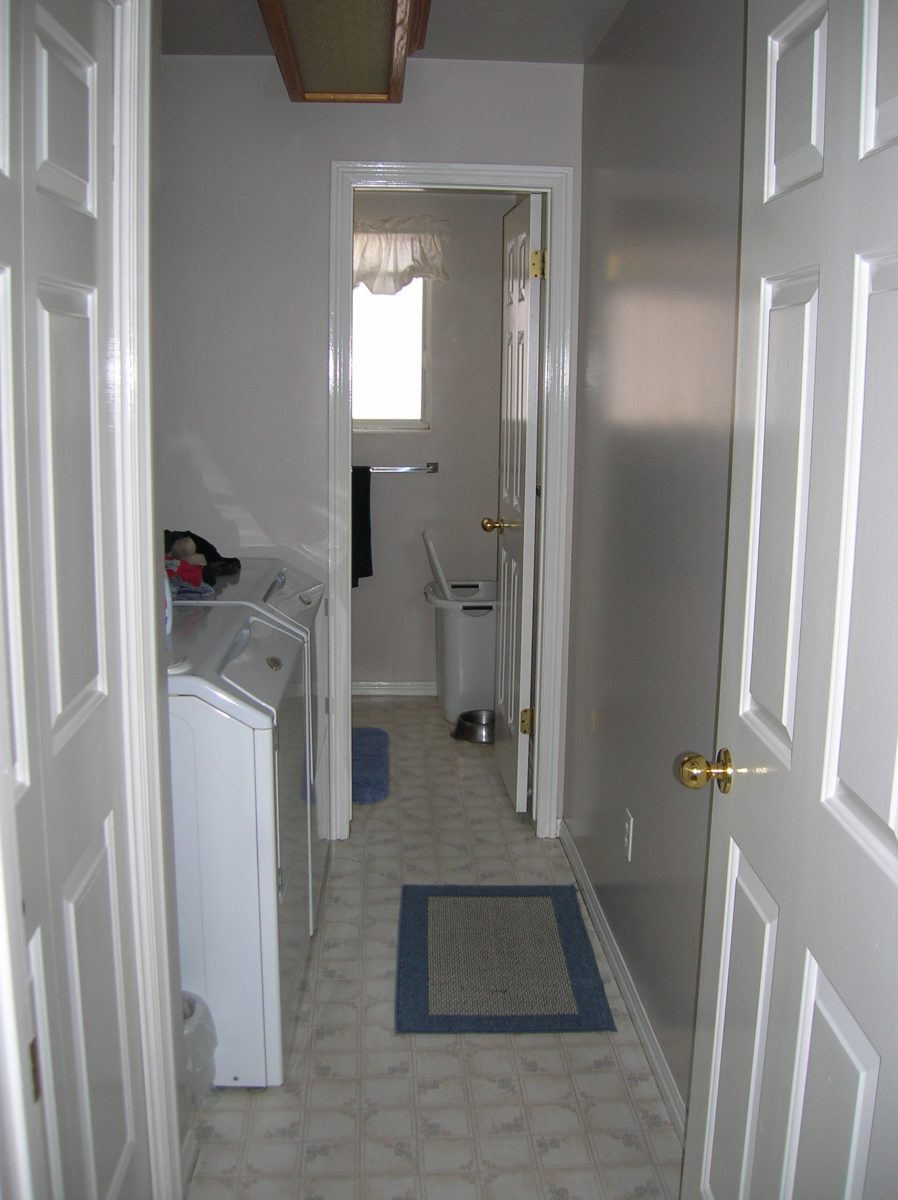 Before laundry mudroom in a split level remodel salt lake city utah | Renovation Design Group