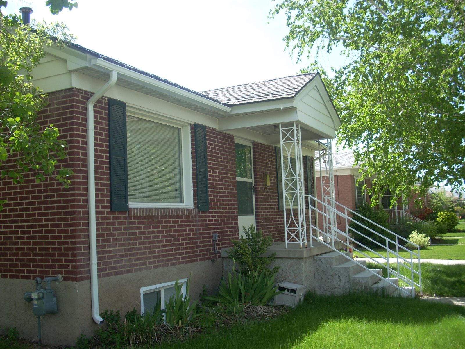 Before_Exterior Renovation_Covered Porch Renovation_Remodel Front Porch DesignsAfter_Interior Remodel_Living Room_Family Room Design resized | Renovation Design Group