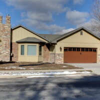 After_Exterior Remodel_Garage Addition_Remodeled 1970's Home | Renovation Design Group