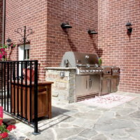 Thumbnail of http://After%20Exterior%20Remodel%20Custom%20Grill%20Federalist%20Style%20|%20Renovation%20Design%20Group