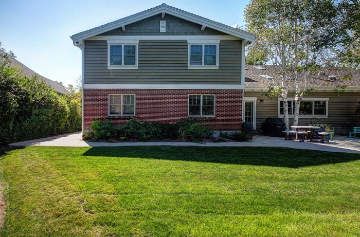 _After_Back Exterior Renovation_ Backyard_1950 Cape Cod RenovationAfter_Interior Remodel_Living Room_Family Room Design resized | Renovation Design Group