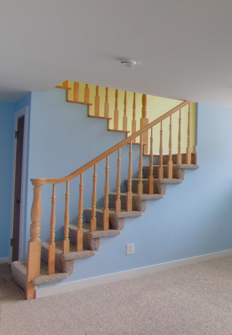 Contemporary Ranch home remodel split stairs into basement | Renovation Design Group