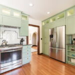 Arches, Arch ways, Kitchen Remodels, Colorful cabinets, mint green cabinets, Tudor Kitchen | Renovation Design Group