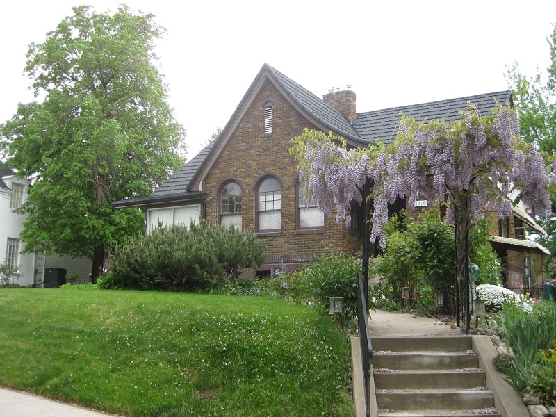 Before Tudor Exterior and second story addition | Renovation Design Group