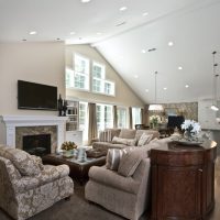 Great room with high ceilings, natural light, fireplace, and modern traditional style | Renovation Design Group