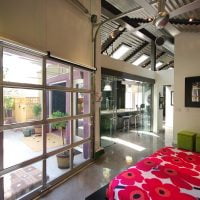 Bungalow Home with Industrial Design Master Bedroom garage Design | Renovation Design Group