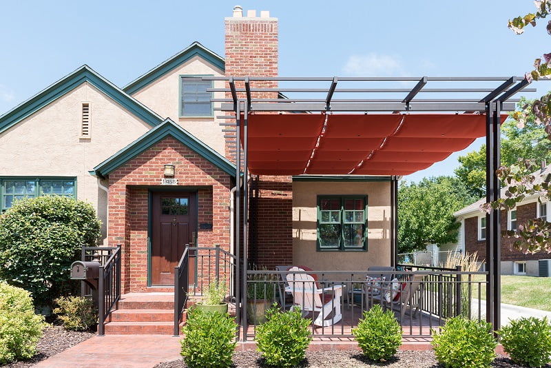 After, Exterior, front porch, pergolas, sun shades | Renovation Design Group