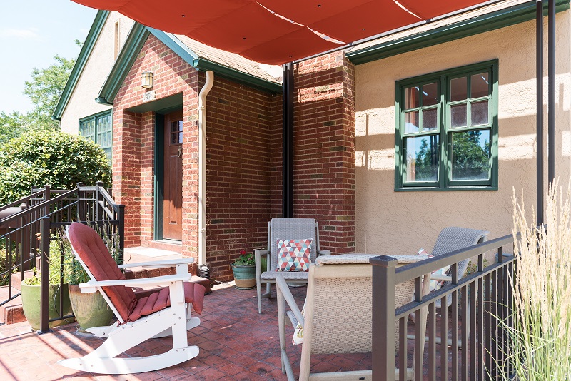 After, Exterior, front porch, pergolas, sun shades | Renovation Design Group