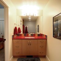 After_Interior_Bathroom Remodels_Red Vanity_Bathroom Remodeling Ideas | Renovation Design Group