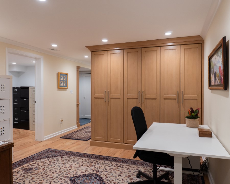 Office with built-in storage cabinets