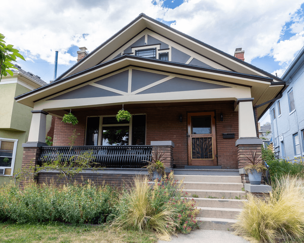 Exterior of a bungalow style home featuring a large front porch.