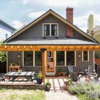 Thumbnail of http://Backyard%20of%20bungalow%20style%20home%20with%20a%20large%20pergola%20and%20patio%20area.