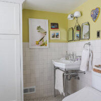 Thumbnail of http://Renovated%20bathroom%20with%20storage%20cabinet,%20sink,%20and%20toilet.