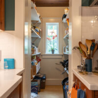 Thumbnail of http://Large%20walk-in%20pantry%20with%20a%20window%20straight%20ahead.