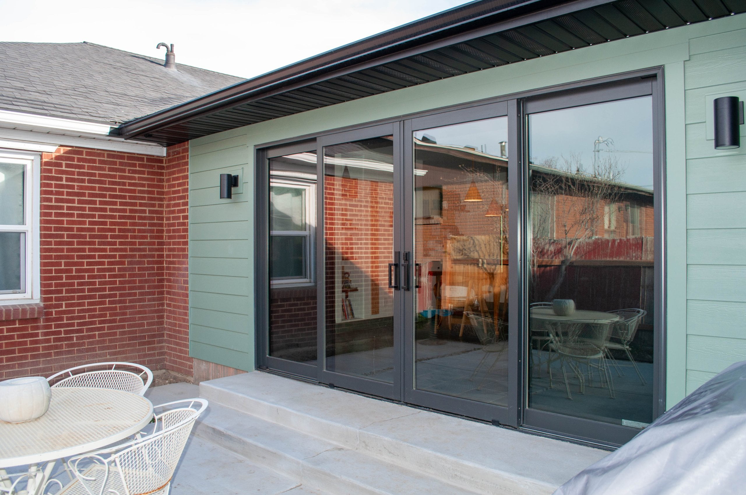 Sliding doors and windows on the exterior of the addition.